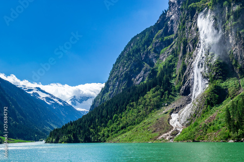 Nature landscape scenery view of a waterfall in Austria, located in the idyllic Zillertal Alps Nature Park