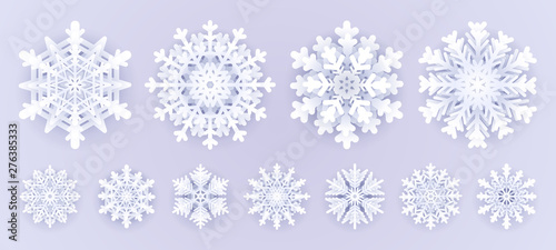 White paper snowflakes isolated on grey background.Merry Christmas Greetings card decoration .Origami Snowfall. 3D paper cut aut style vector illustration.