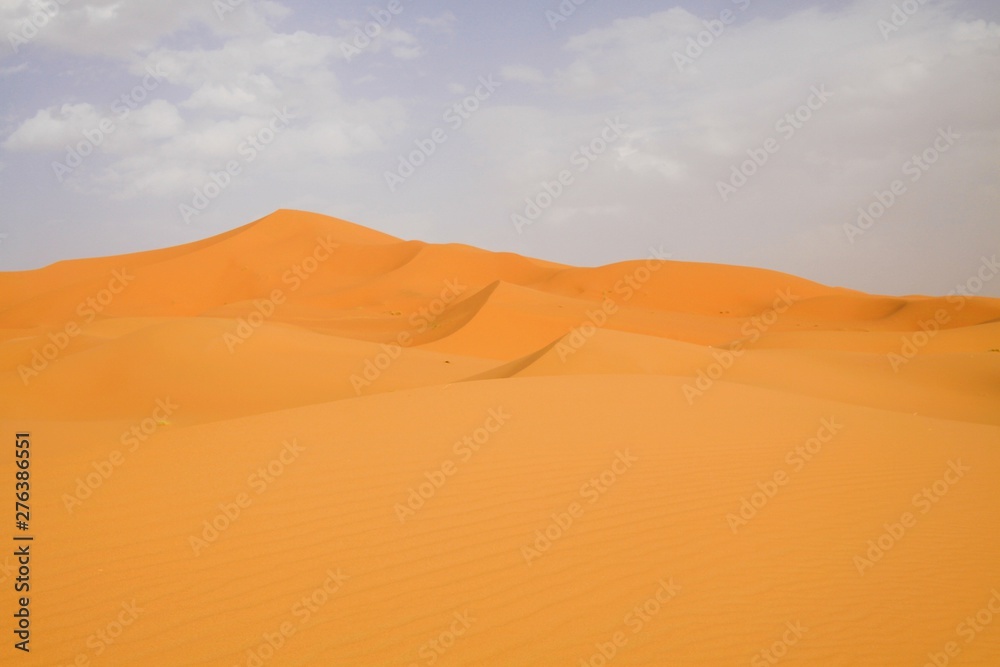 Lonely isolated sand dunes belt in the Sahara desert near Erg Chebbi, Morocco