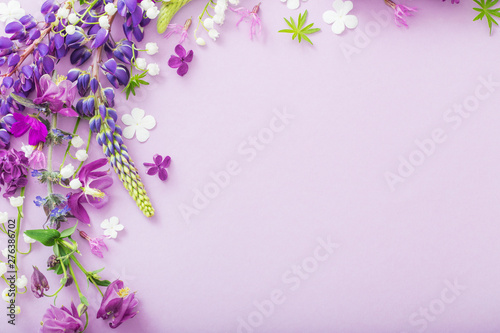purple, blue, pink flowers on paper background
