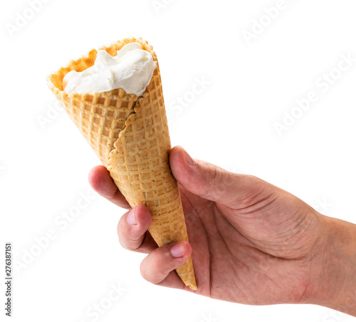 Ice cream cone in a man hand carved on a white. photo