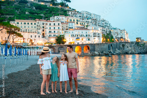 Obraz na płótnie Adorable little girl on sunset in Amalfi town in Italy w salonie