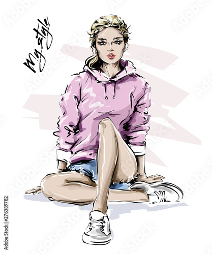 Hand drawn beautiful young woman in sport clothes. Stylish blonde hair girl. Fashion woman look. Sketch. Vector illustration.