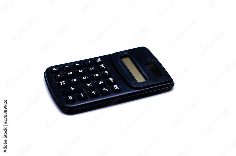 Black calculator placed isolated on a white background.Copy space. Black calculator placed isolated on a white background.Copy space.