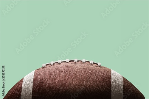 American football ball on background