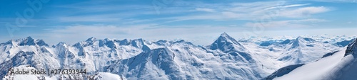 Winter mountains panorama view with the high peaks covered by the snow near Saas-Fee in Switzerland.