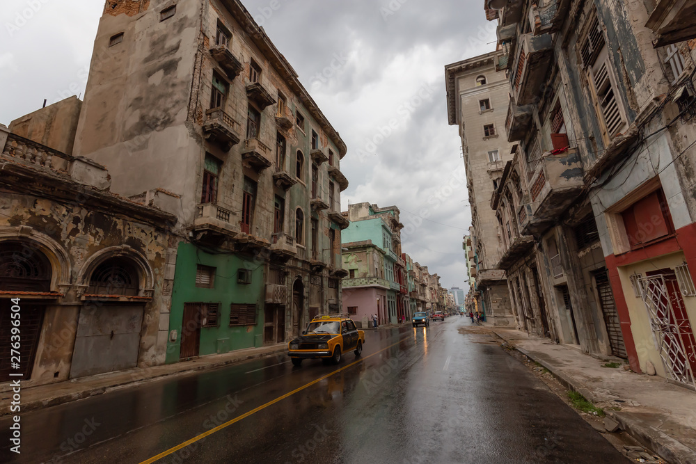 Street view of the beautiful Old Havana City, Capital of Cuba, during a wet and rainy day.