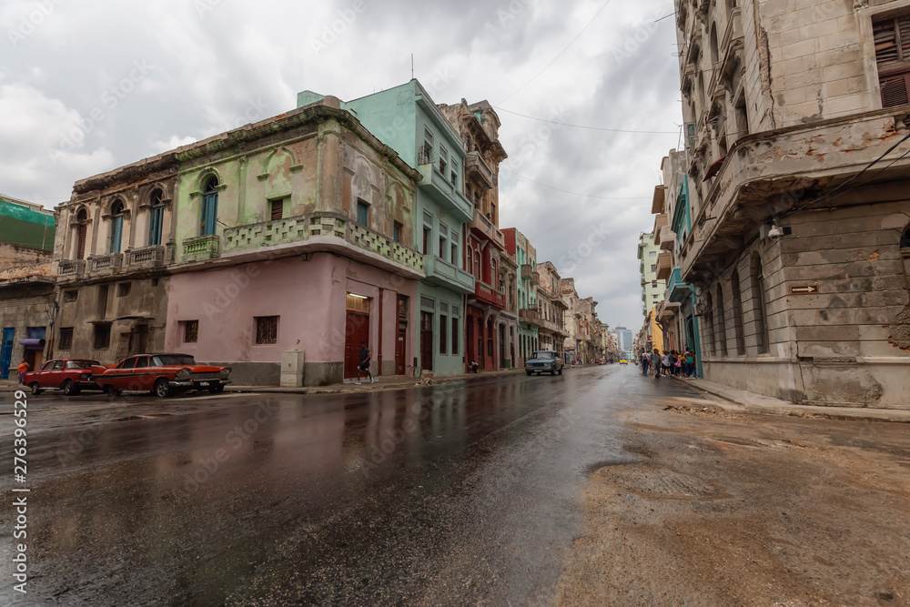 Street view of the beautiful Old Havana City, Capital of Cuba, during a wet and rainy day.