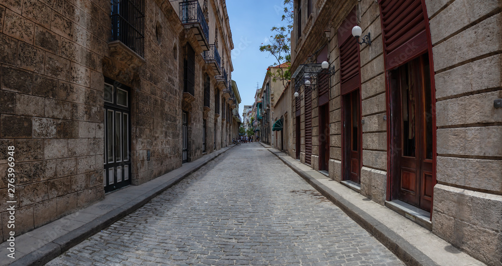 Panoramic Street view of the Old Havana City, Capital of Cuba, during a bright and sunny day.