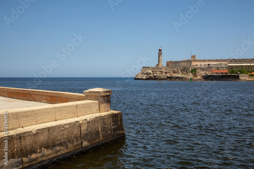 Fototapeta Naklejka Na Ścianę i Meble -  Beautiful view of the Lighthouse in the Old Havana City, Capital of Cuba, during a vibrant sunny day.