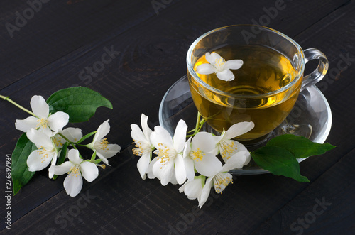 Green tea with jasmine in cup.