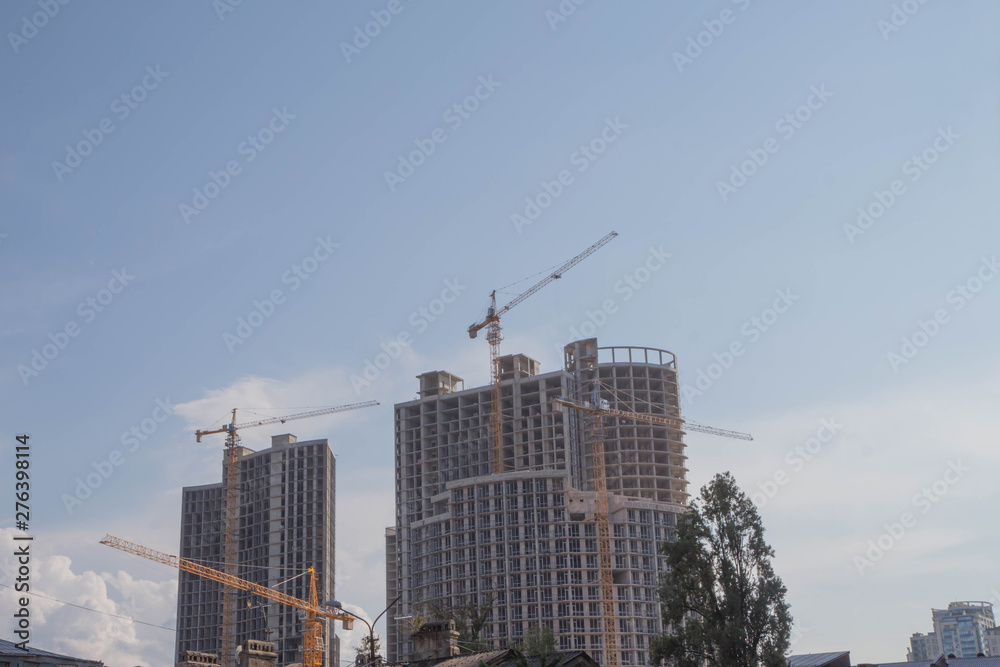 Construction of skyscrapers on a background of the dark