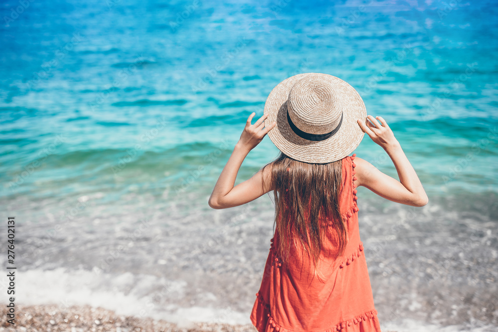 Cute little girl at beach during summer vacation Stock Photo | Adobe Stock