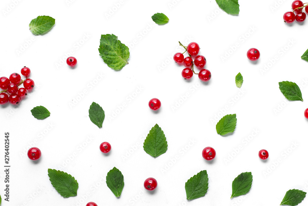 Fruit pattern made of fresh berries and green leaves on white background. Concept of healthy food. Flat lay, top view, copy space Fruit pattern made of fresh berries and green leaves on white background. Concept of healthy food. Flat lay, top view, copy space
