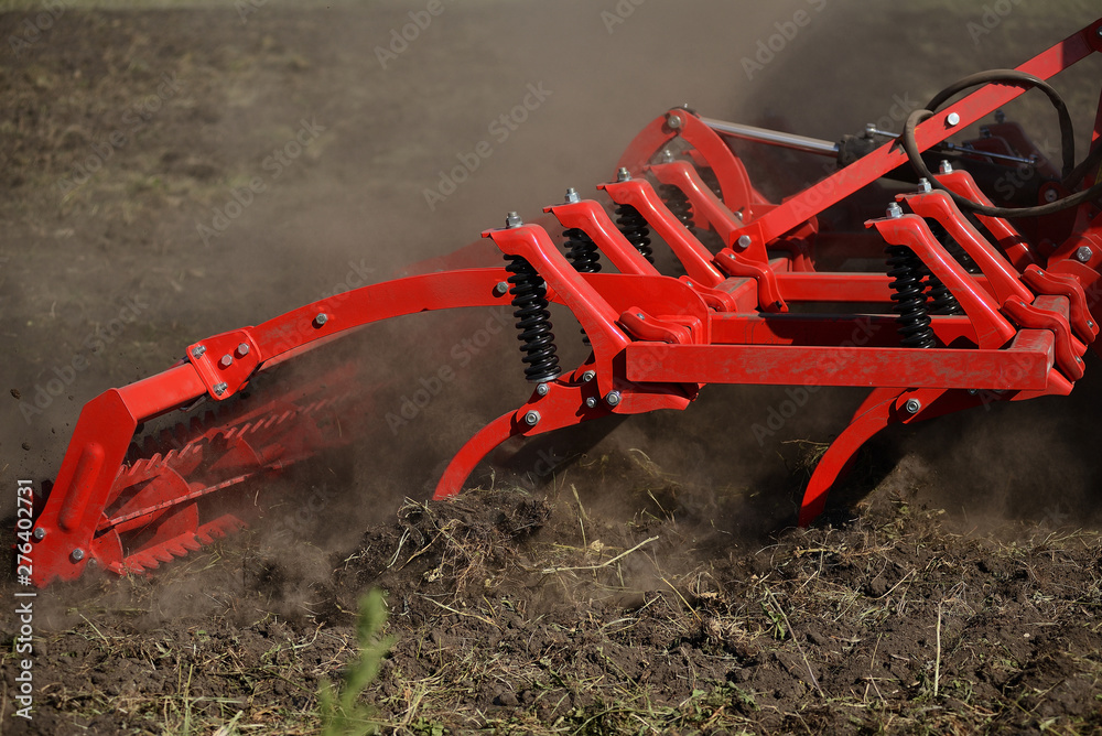 Agricultural plow close-up on the ground, agricultural machinery.