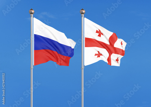 Russia vs Georgia. Thick colored silky flags of Russia and Georgia. 3D illustration on sky background. – Illustration