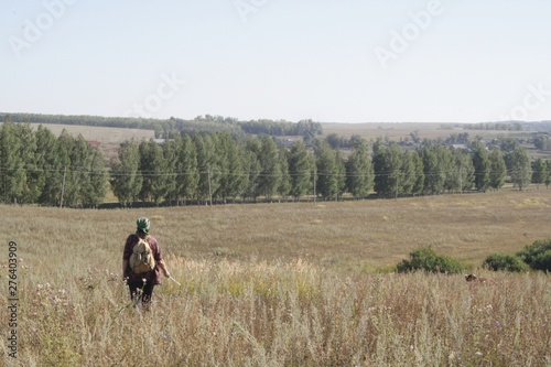 man riding a bike in the field