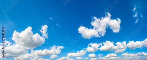Blue clear sky shot background backdrop panorama with scattered clouds panoramic image of summer spring beautiful day © Moon Safari
