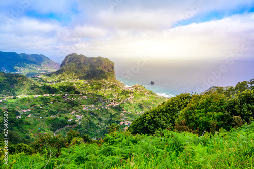 Landscape scenery from Portela Viewpoint - Porto da Cruz at beautiful coast and mountains in the north of Madeira island - Ribeira Frio-Portela, Portugal. photo