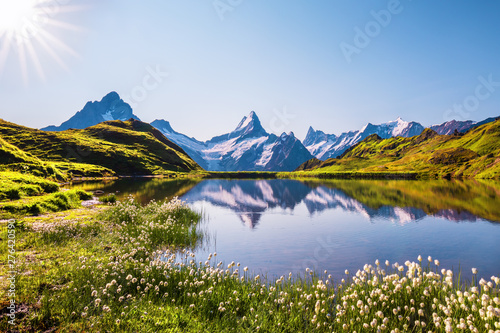 Sunrise view on Bernese range above Bachalpsee lake. Highest peaks Eiger, Jungfrau and Faulhorn in famous location. Switzerland alps, Grindelwald valley