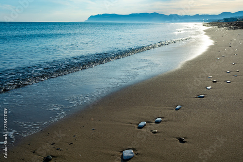 Fototapeta Naklejka Na Ścianę i Meble -  Coastline with sandy beach and clear sea water in Alcamo Marina, small town in Sicily, Italy, summer vacation destination