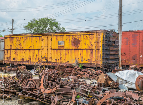 фотографія Old boxcar abandoned in train yard
