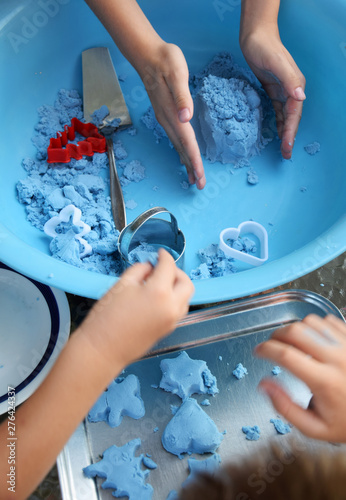 kids play kinetic sand