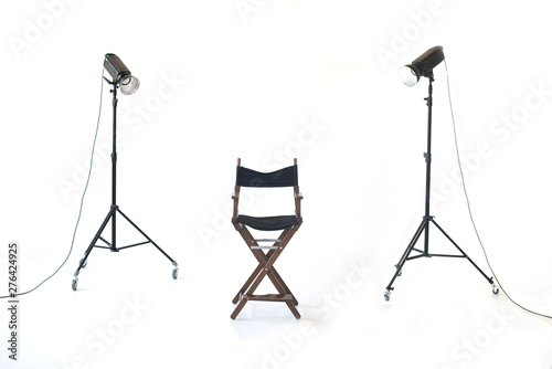 Ready photo shoot setup in white background in the studio. Photography Studio with Empty Chair