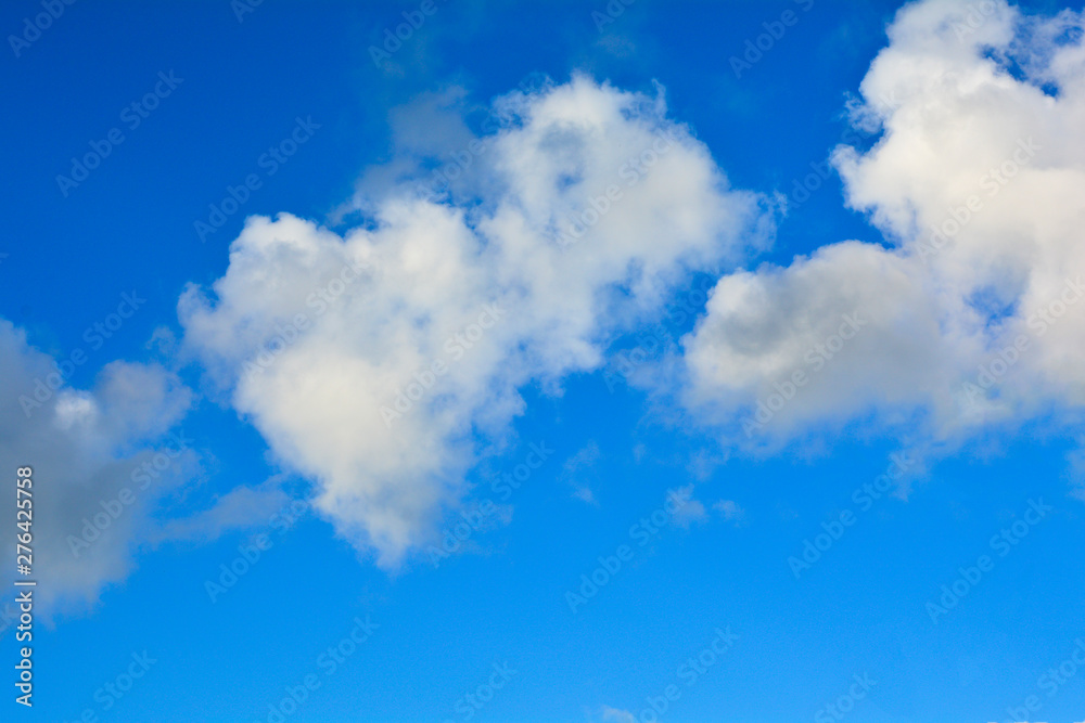 blue sky background with tiny clouds. blue sky background with tiny clouds.