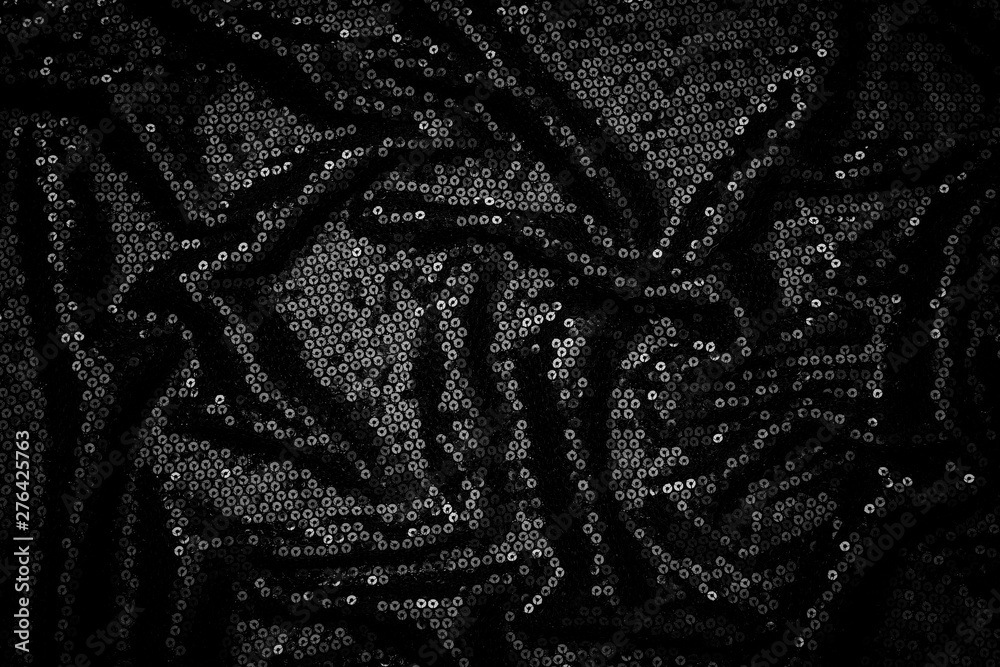 Metal glitter black cloth background, close up. Trendy Metallic dark fabric  texture. Black sequins, sparkling sequined textile Stock Photo
