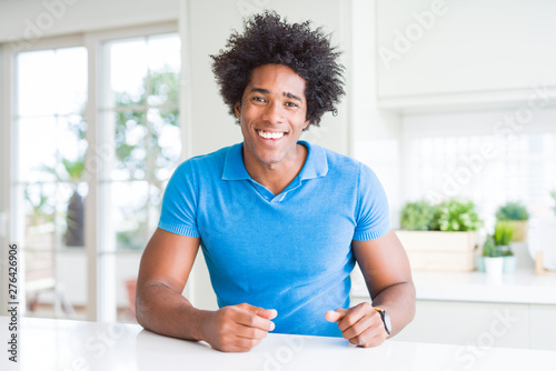 African American man at home with a happy and cool smile on face. Lucky person.