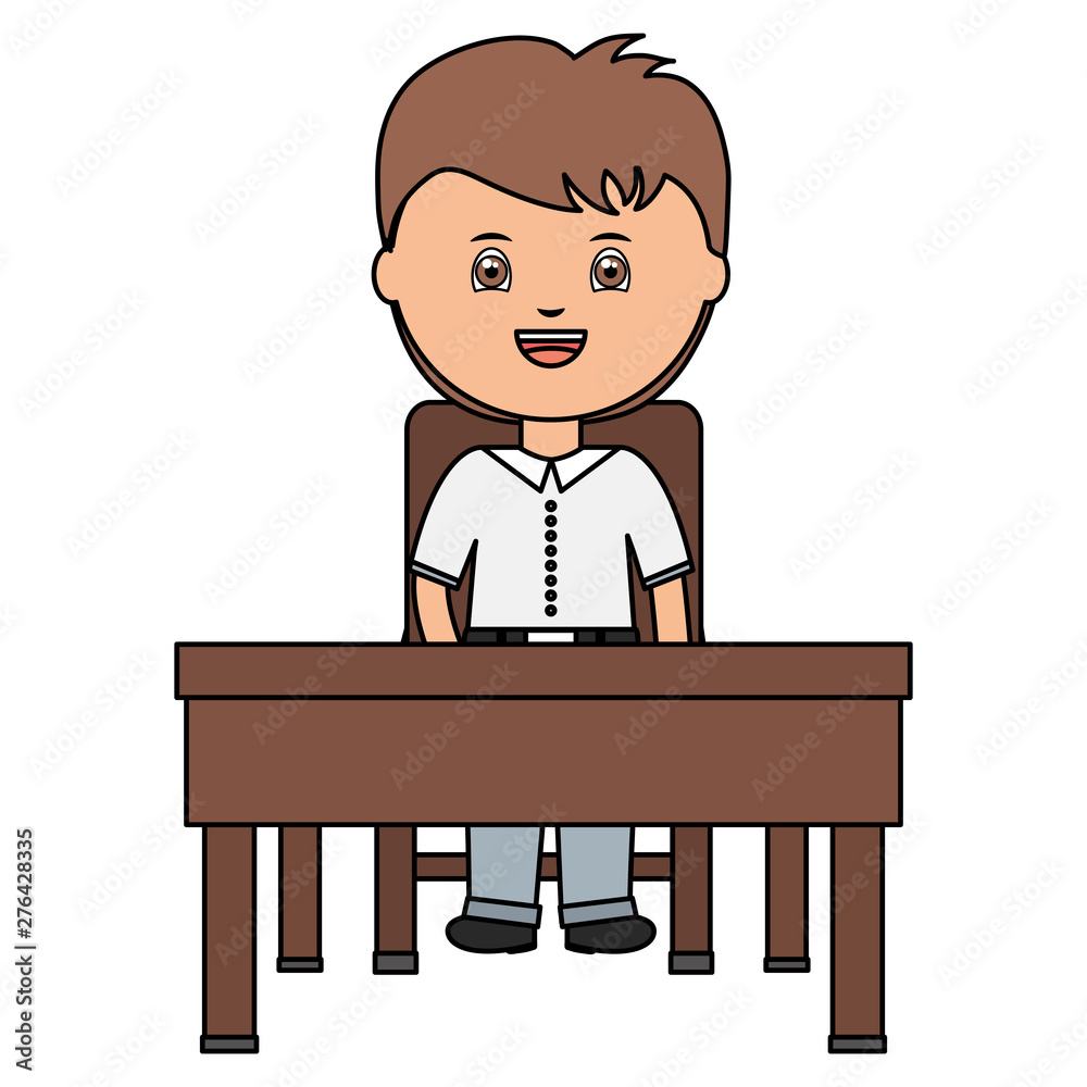 cute little student boy seated in schooldesk cute little student boy seated in schooldesk
