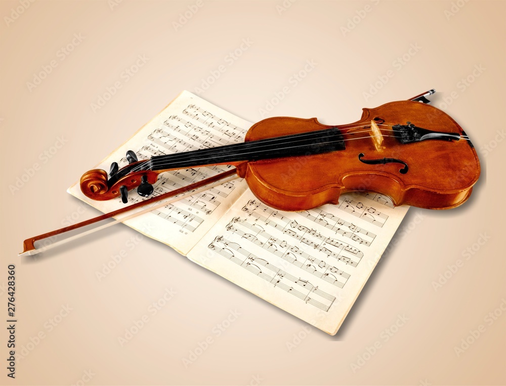 Fototapeta premium Close-up Photo Of Violin And Musical Notes