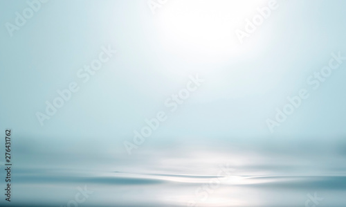 Blurred beach with bokeh sunlight wave abstract background. Vintage tone