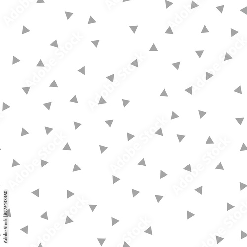 Triangles seamless pattern. Randomly distributed triangle texture background.