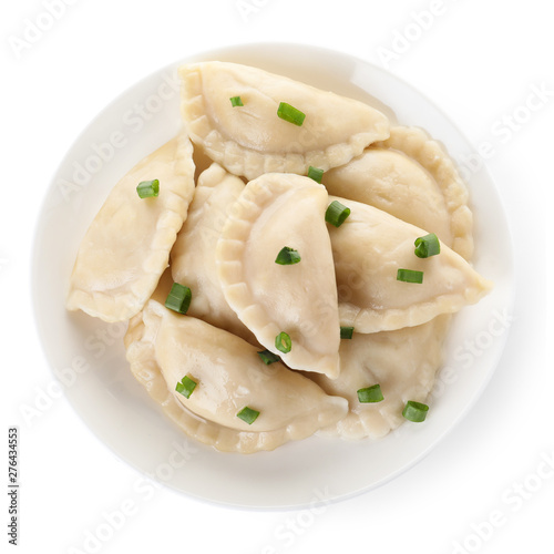 Plate of tasty cooked dumplings isolated on white, top view