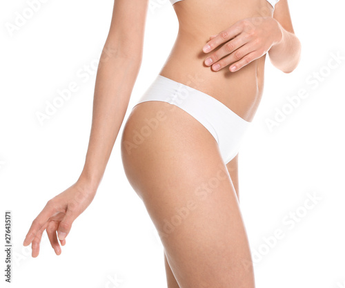 Slim young woman with smooth skin on white background, closeup. Beauty and body care concept