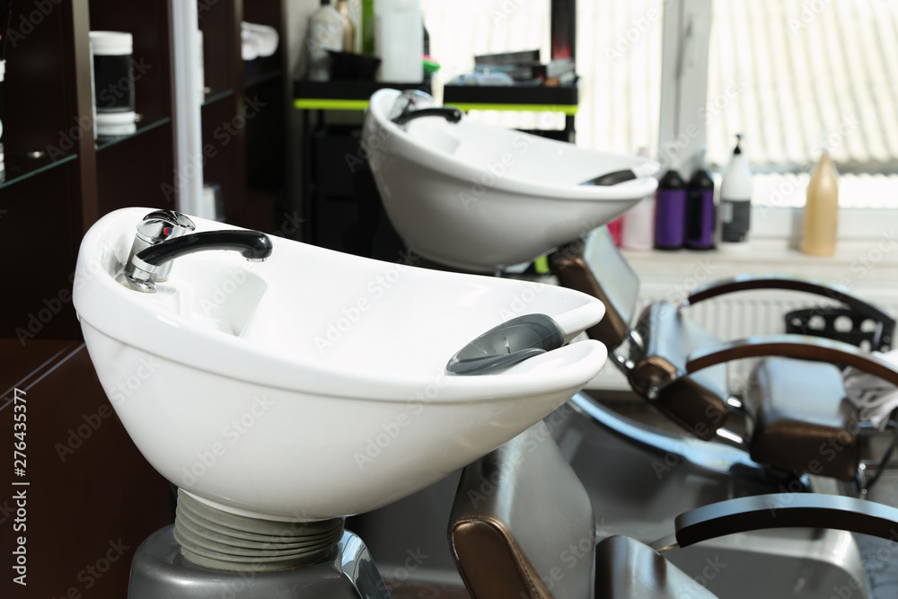 Hair washing sink in modern beauty salon Stock Photo | Adobe Stock