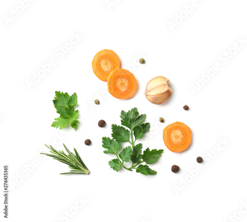 Quadro su tela Flat lay composition with green parsley, rosemary, pepper and vegetables on whit