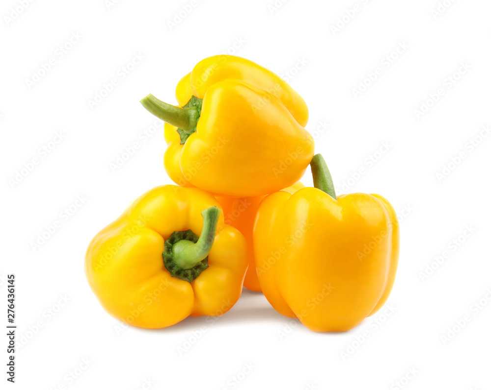 Ripe yellow bell peppers isolated on white Ripe yellow bell peppers isolated on white