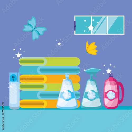 housekeeping tools with bottles products and folded towels