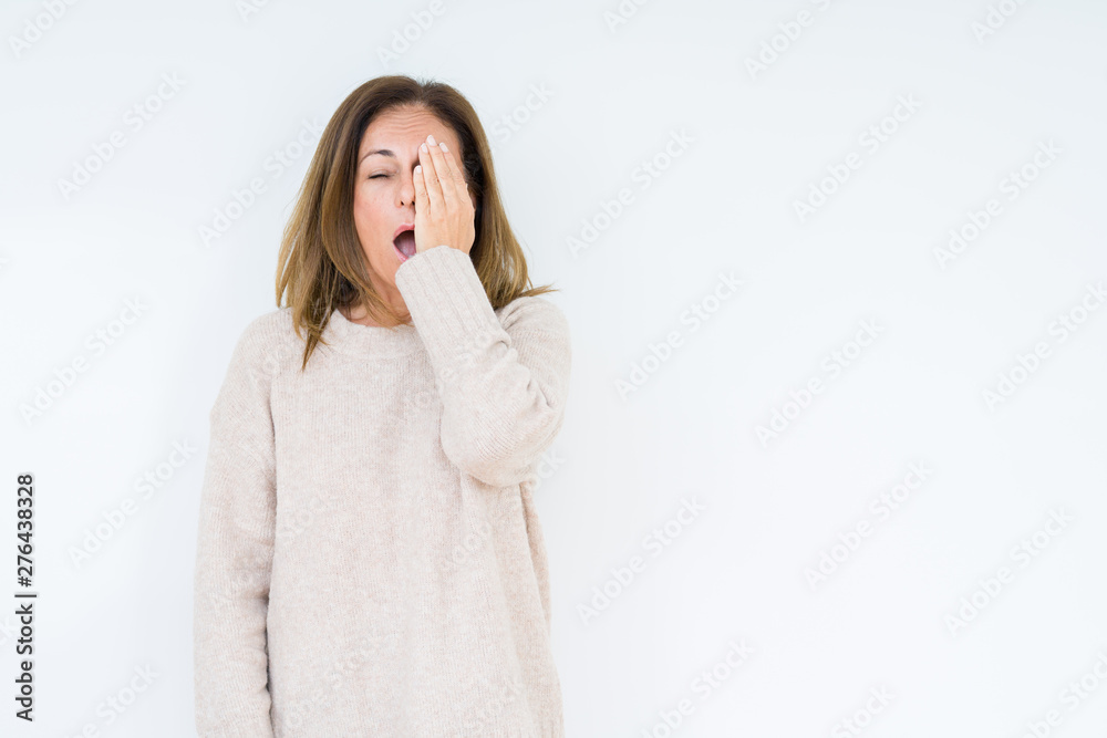 Beautiful middle age woman over isolated background Yawning tired covering half face, eye and mouth with hand. Face hurts in pain. Beautiful middle age woman over isolated background Yawning tired covering half face, eye and mouth with hand. Face hurts in pain.