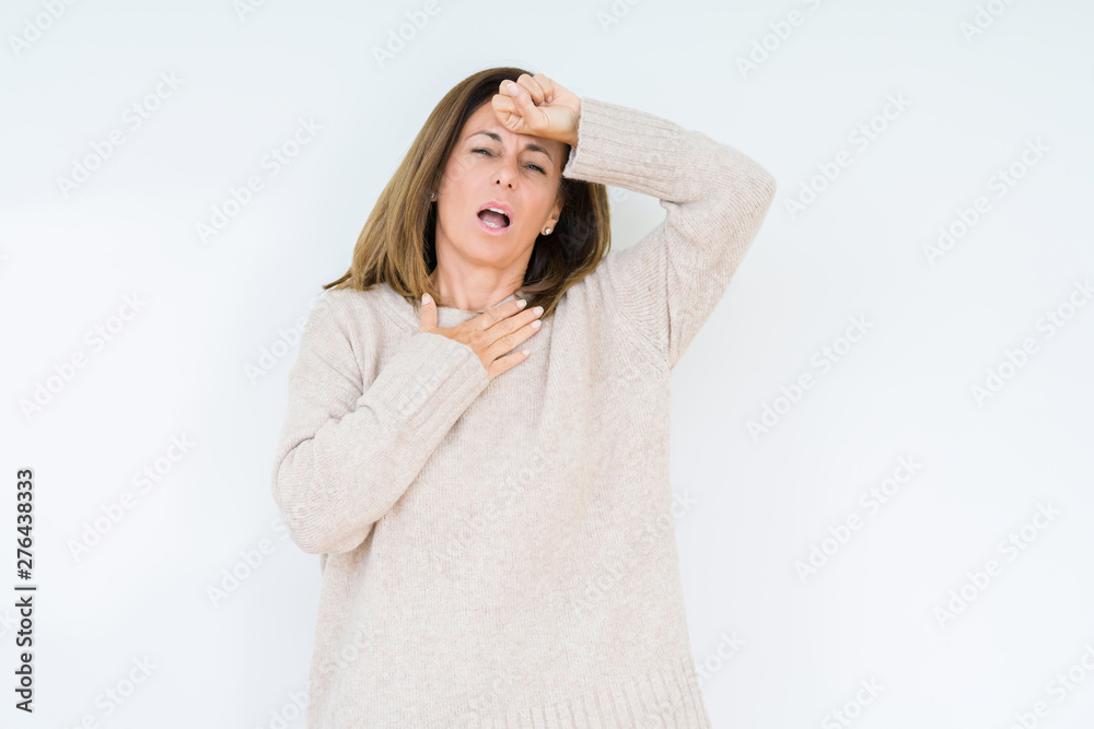 Beautiful middle age woman over isolated background Touching forehead for illness and fever, flu and cold, virus sick Beautiful middle age woman over isolated background Touching forehead for illness and fever, flu and cold, virus sick