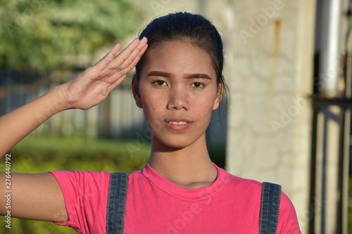 A Saluting Filipina Female