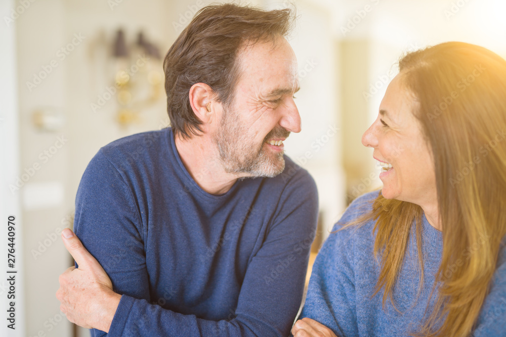 Romantic middle age couple in love at home Romantic middle age couple in love at home