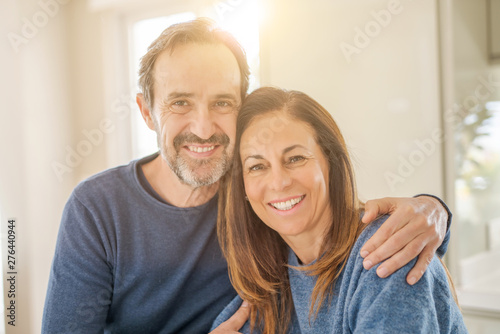 Romantic middle age couple in love at home