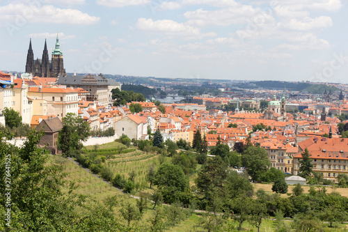 Summer Prague City with gothic Castle and the green Nature from the Hill Petrin, Czech Republic