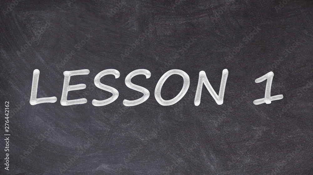 Obraz premium Lesson 1 written on blackboard