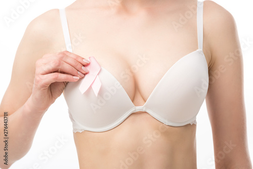 partial view of woman in bra with pink ribbon isolated on white