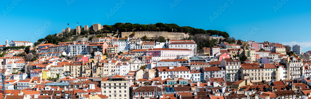 A panoramic view of Lisbon, Portugal's skyline with the Castelo de St Jorge